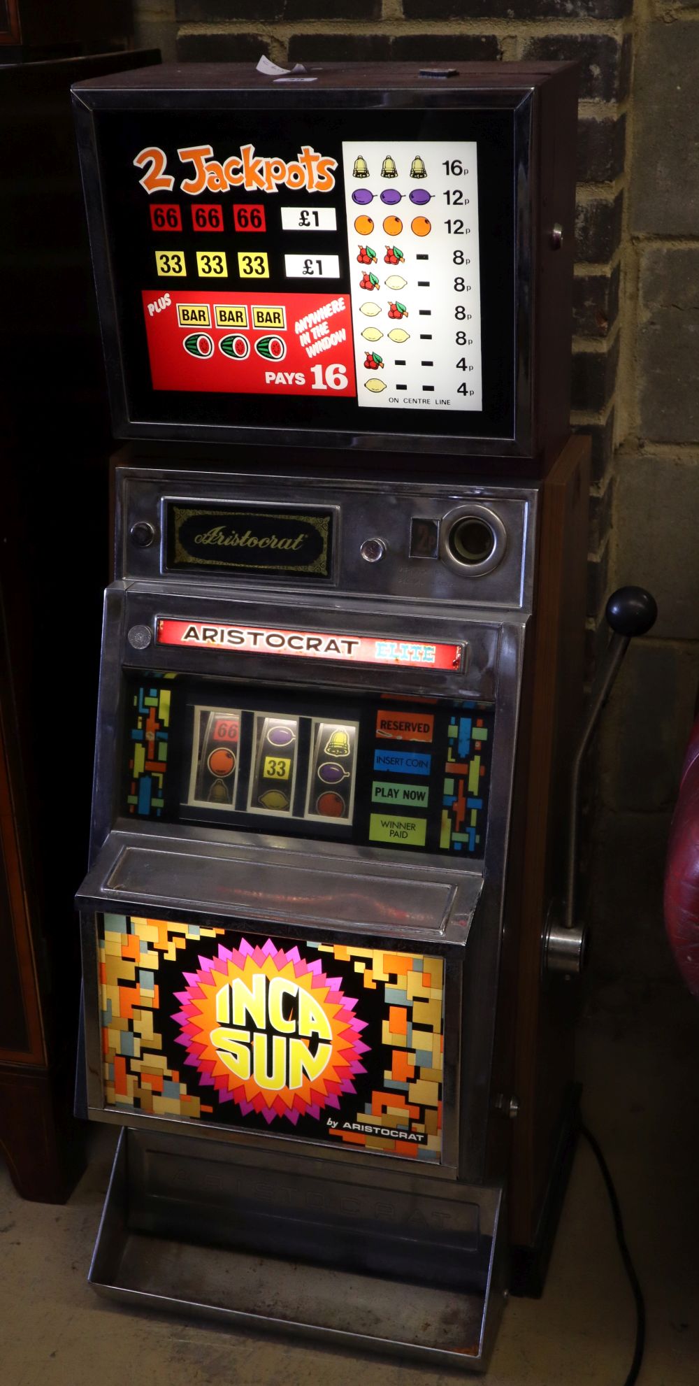 An Aristocrat Inca Sun fruit machine, W.55cm, D.112cm (In working order)